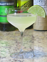 Closing Argument cocktail garnished with a lime wheel