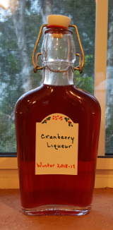 A bottle of Kathy's cranberry liqueur