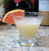 Hemingway Daiquiri cocktail with a grapefruit wheel garnish
