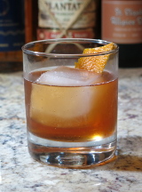 Rum Old Fashioned cocktail in an old-fashioned glass